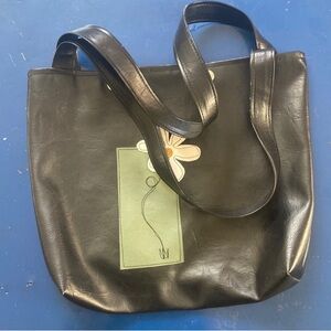 Elegant Black Tote with Floral Accent